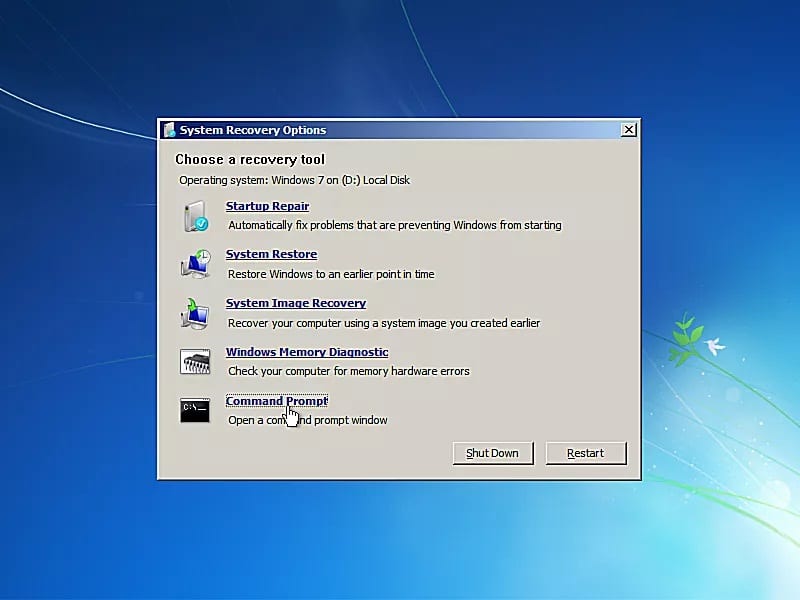 cliquez sur l'invite de commande dans les options de récupération du système Windows 7